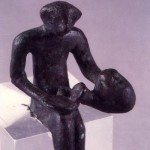 Monte Sirai - Carbonia (CA). Bronzo figurato fenicio di offerente una libagione con brocca askoide (VII sec. a.C.).
